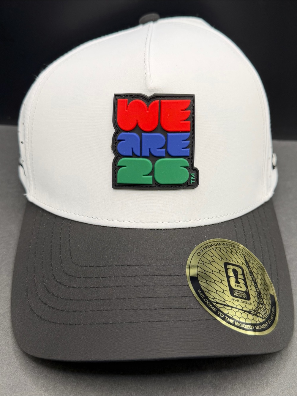 FIFA- White & Black Trucker Hat with Colorful 'WE ARE 26' NWT